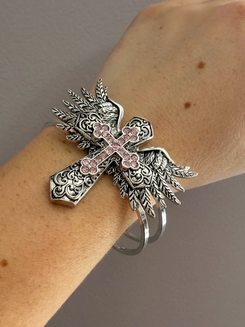 Silver Winged Cross Bracelet with Pink Accents